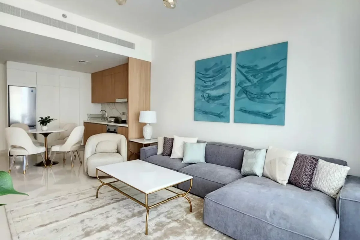 Large gray sofa in the living room of an apartment in Dubai