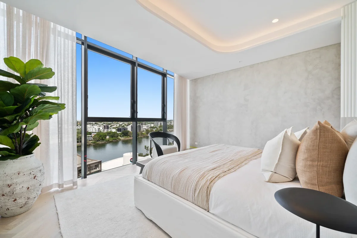 master bedroom with panoramic windows