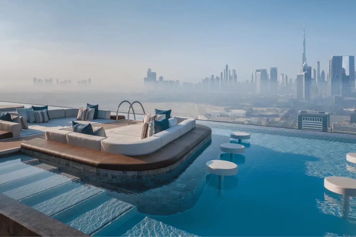 A lounge area with a swimming pool in a new skyscraper in Dubai