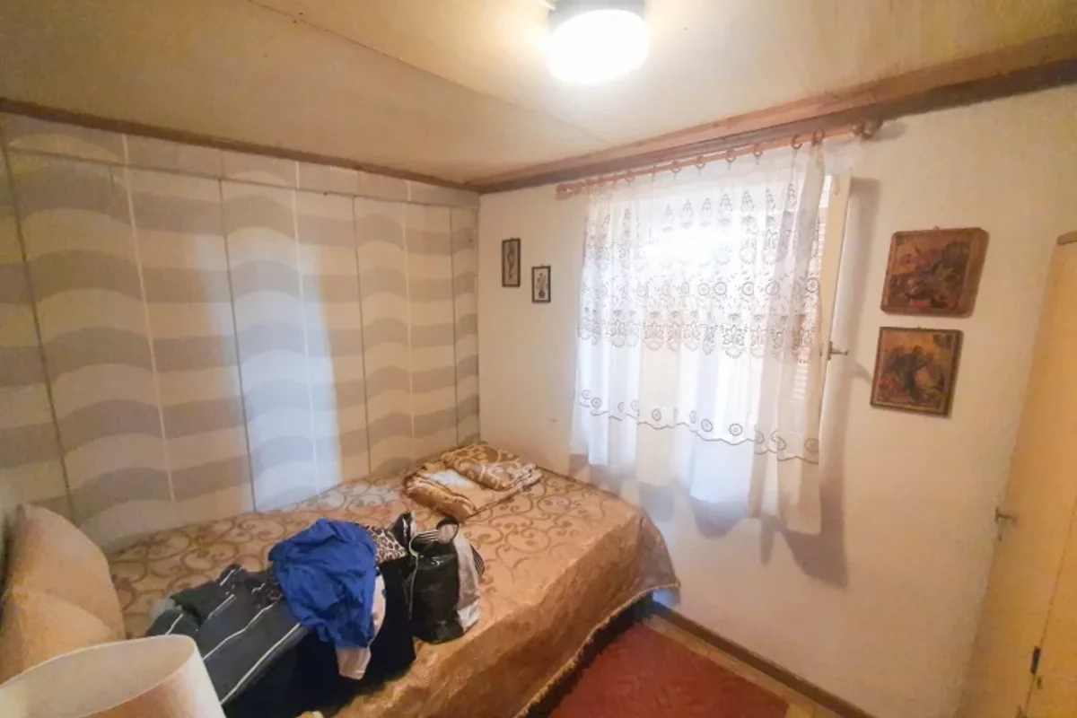 a bedroom in a house on the island of Thassos