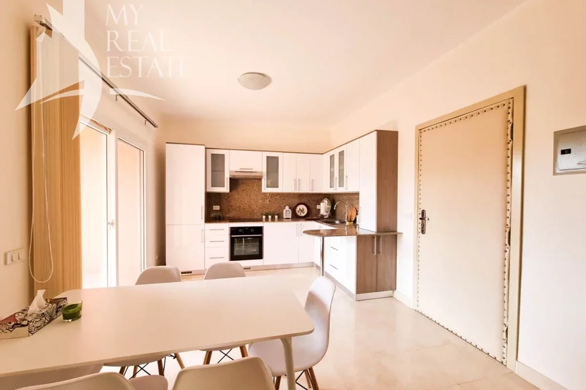Kitchen in a Hurghada apartment with dining area