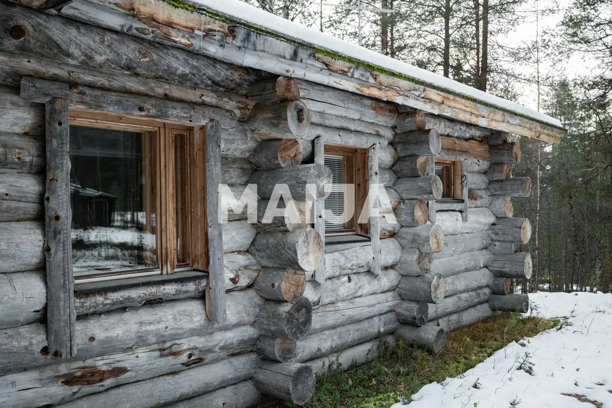 a snowy Christmas cottage