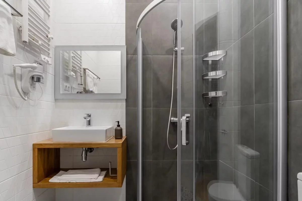 hotel bathroom with shower and washbasin