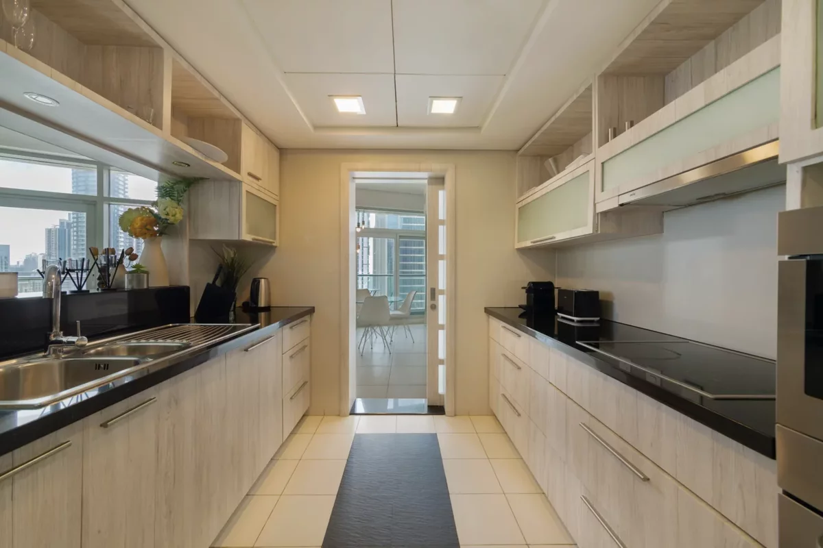Small bright kitchen in an apartment in a residential complex in Dubai