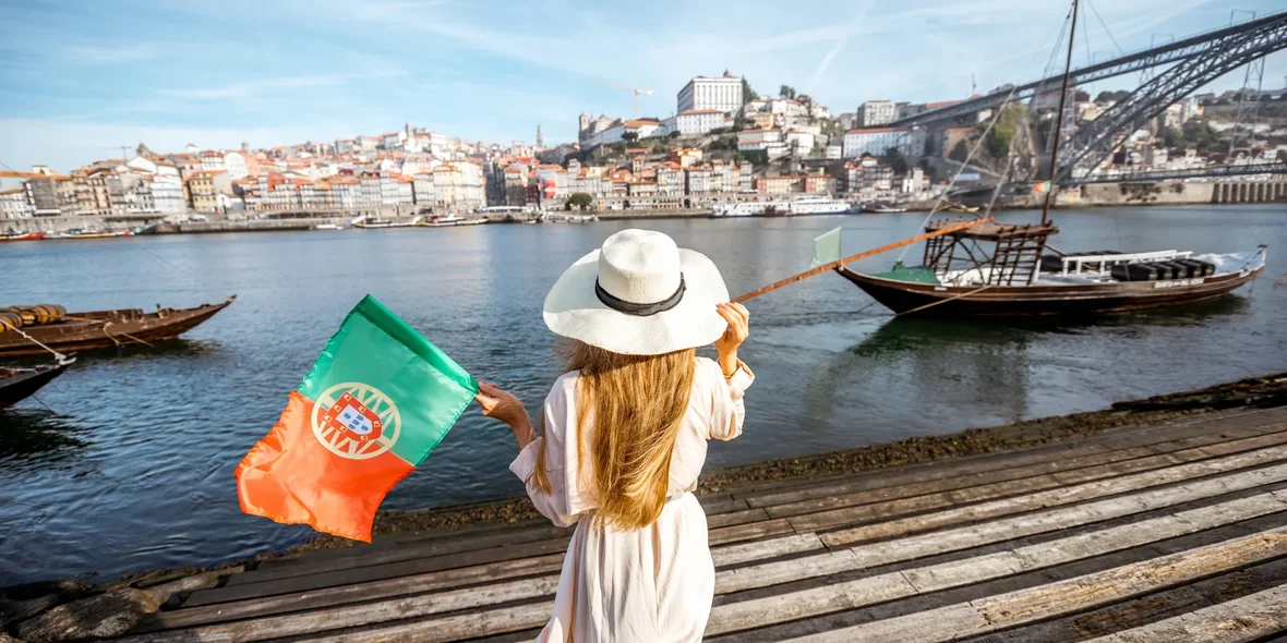 A woman travelling around the city of Porto, Portugal