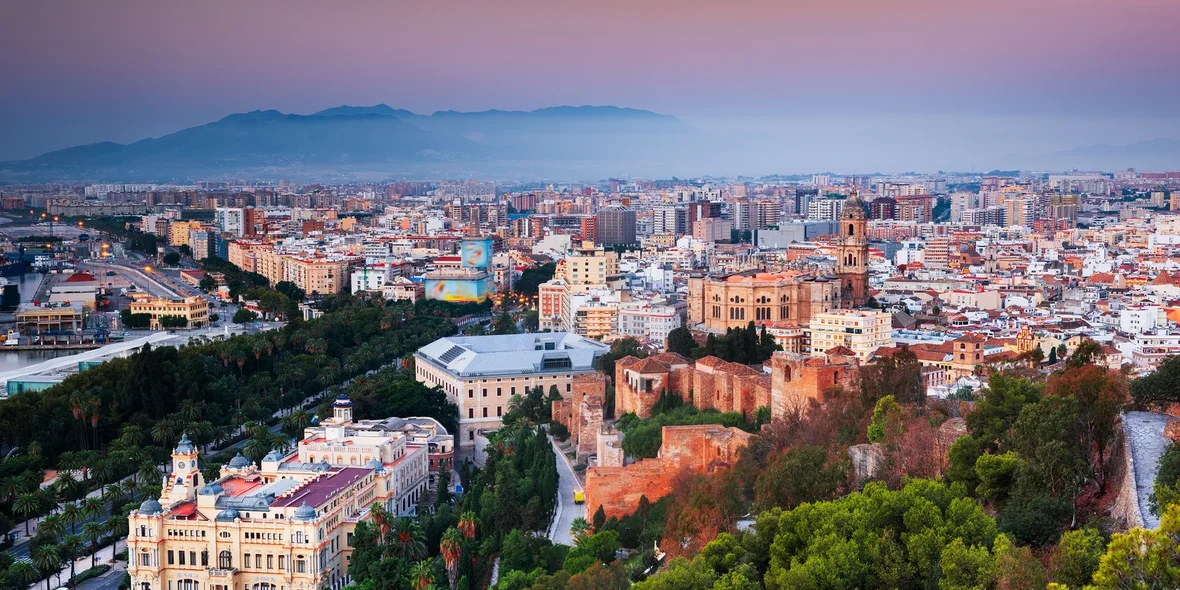 Malaga, Spain, cityscape at the cathedral, city hall and Alcazaba fortress in Malaga