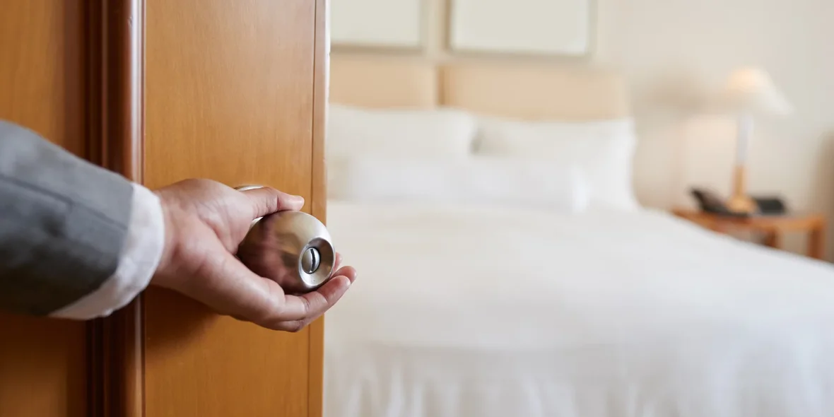 Open door to a hotel room