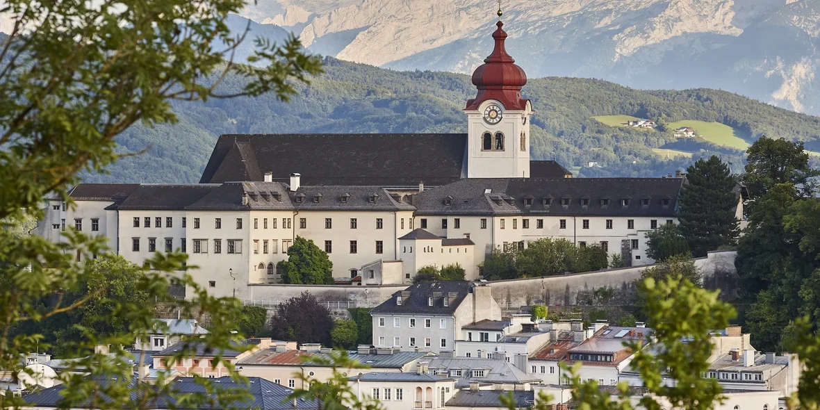 Nonnberg Abbey and the alpine ridge in Salzburg. A destination for traveling. Austria