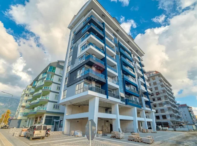 Квартира 1 комната 60 м² Махмутлар, Турция
