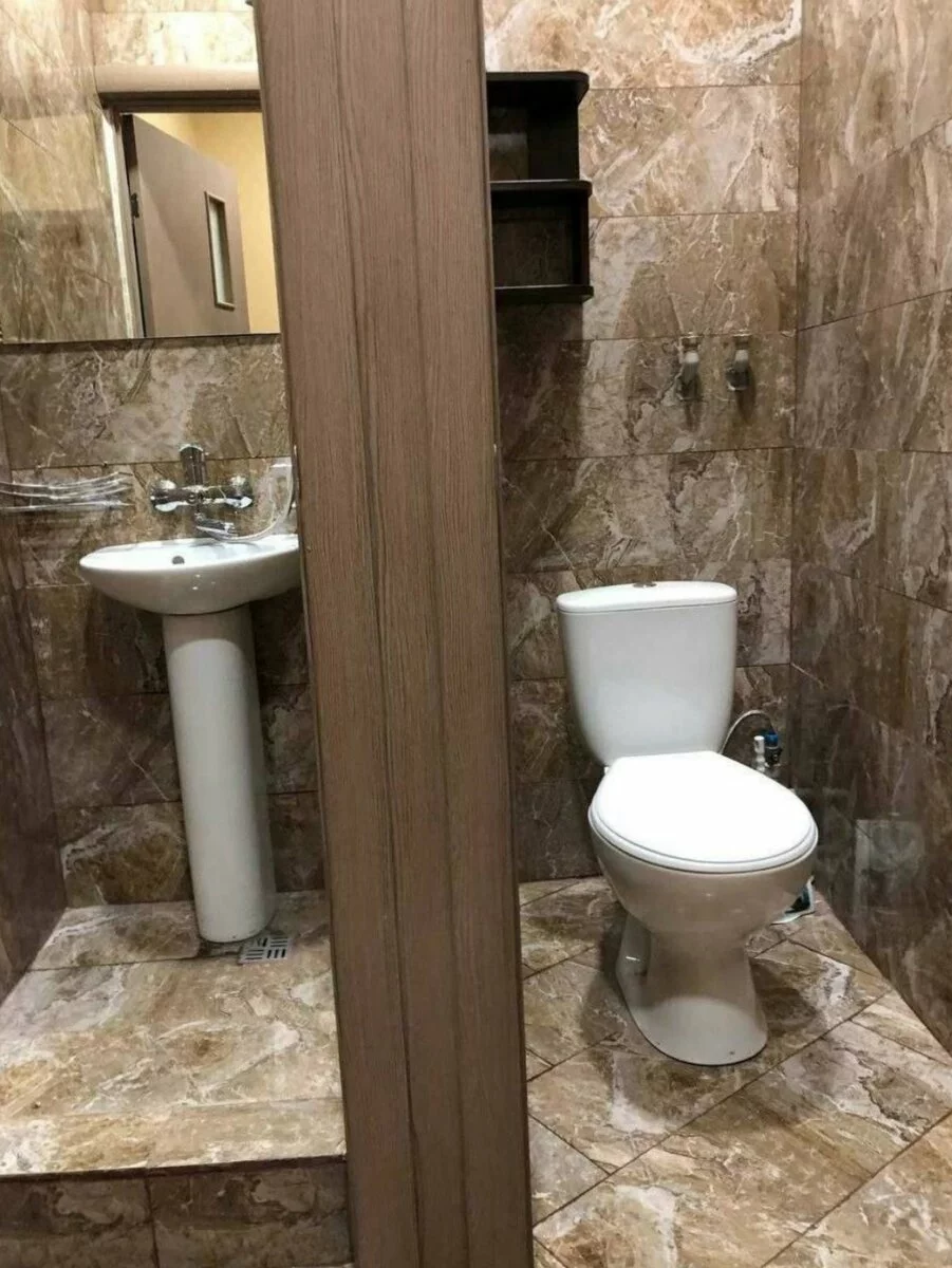 Photo of a bathroom in one-room apartment in Odessa