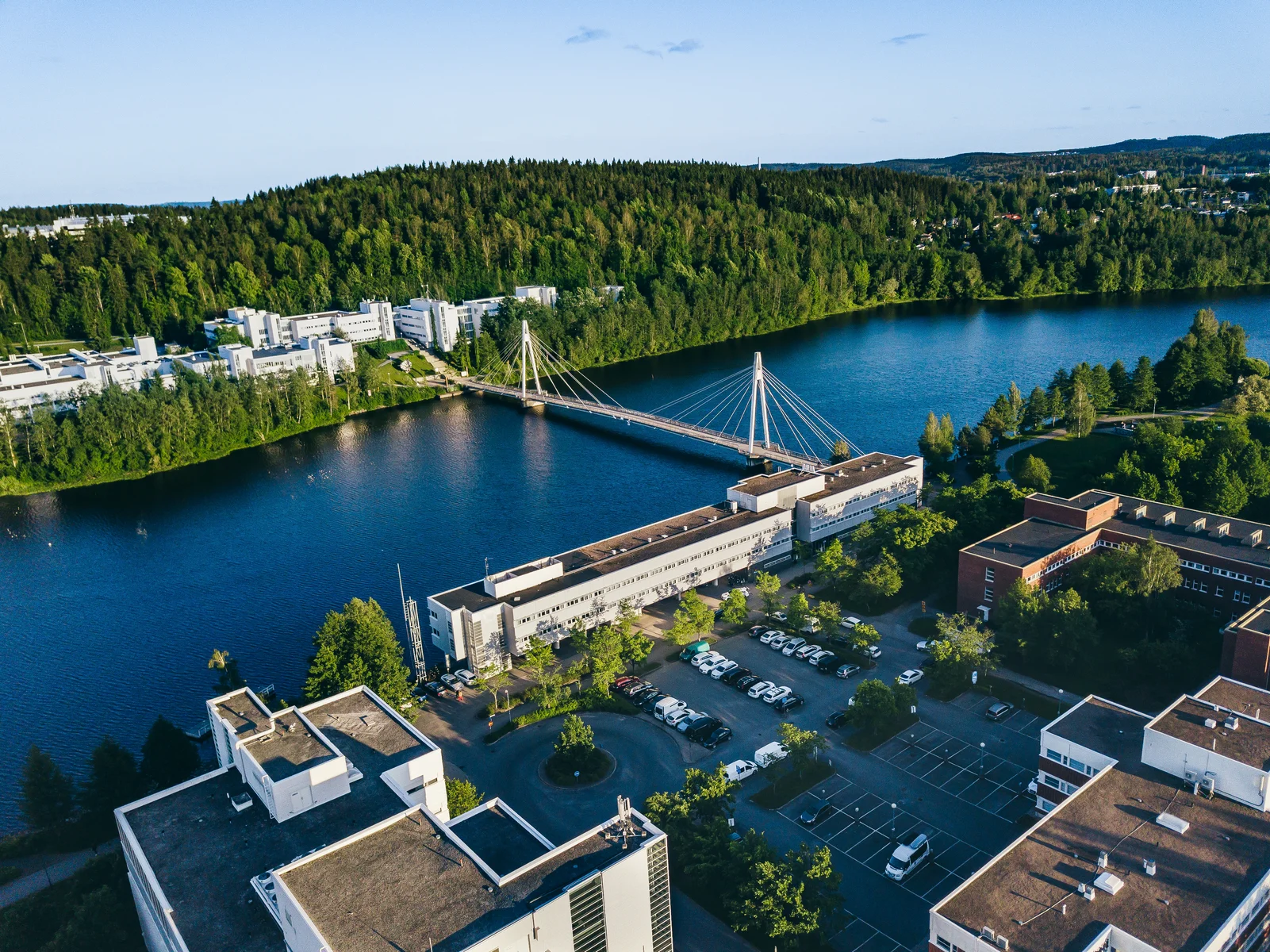 An aerial view of the campus with Julisto Bridge over the river in Jyväskylä, Finland