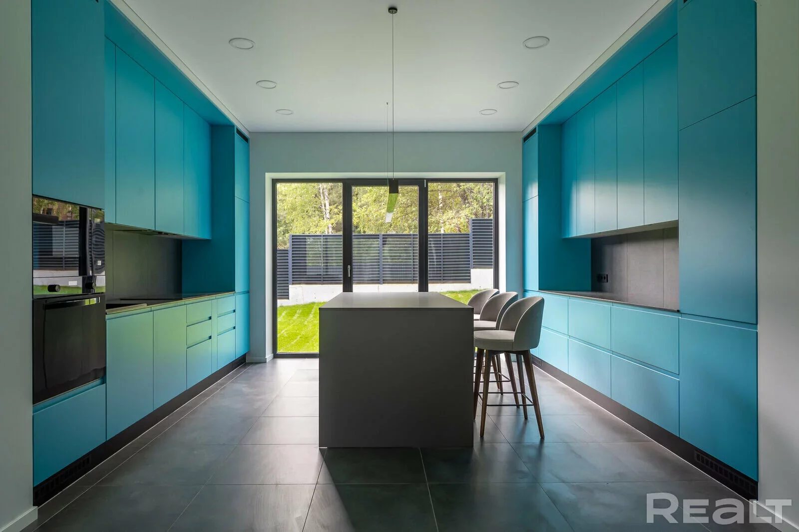 The blue front of the kitchen of a modern home