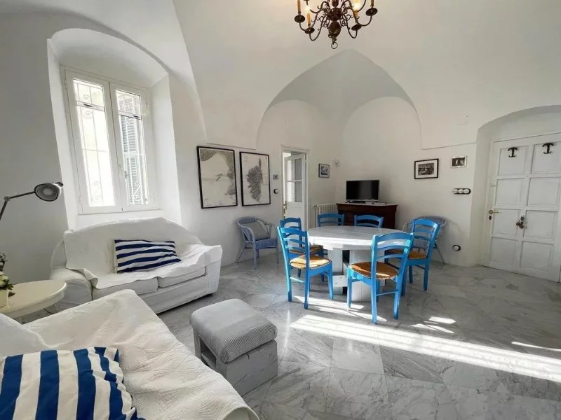 white walls and furniture in the villa's living room