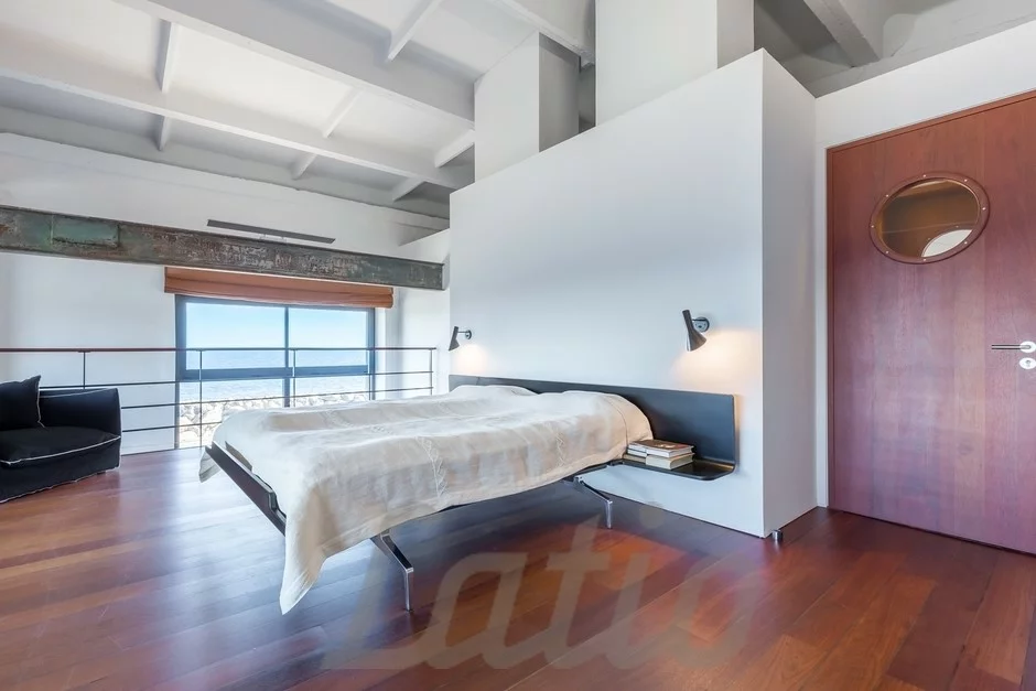 Photo of a bedroom in a house on the coast