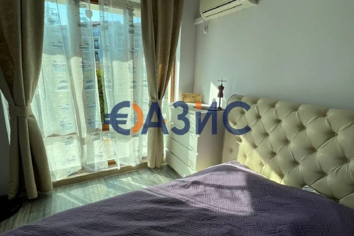 Спальня в продаваемой двухкомнатной квартире в Черногории