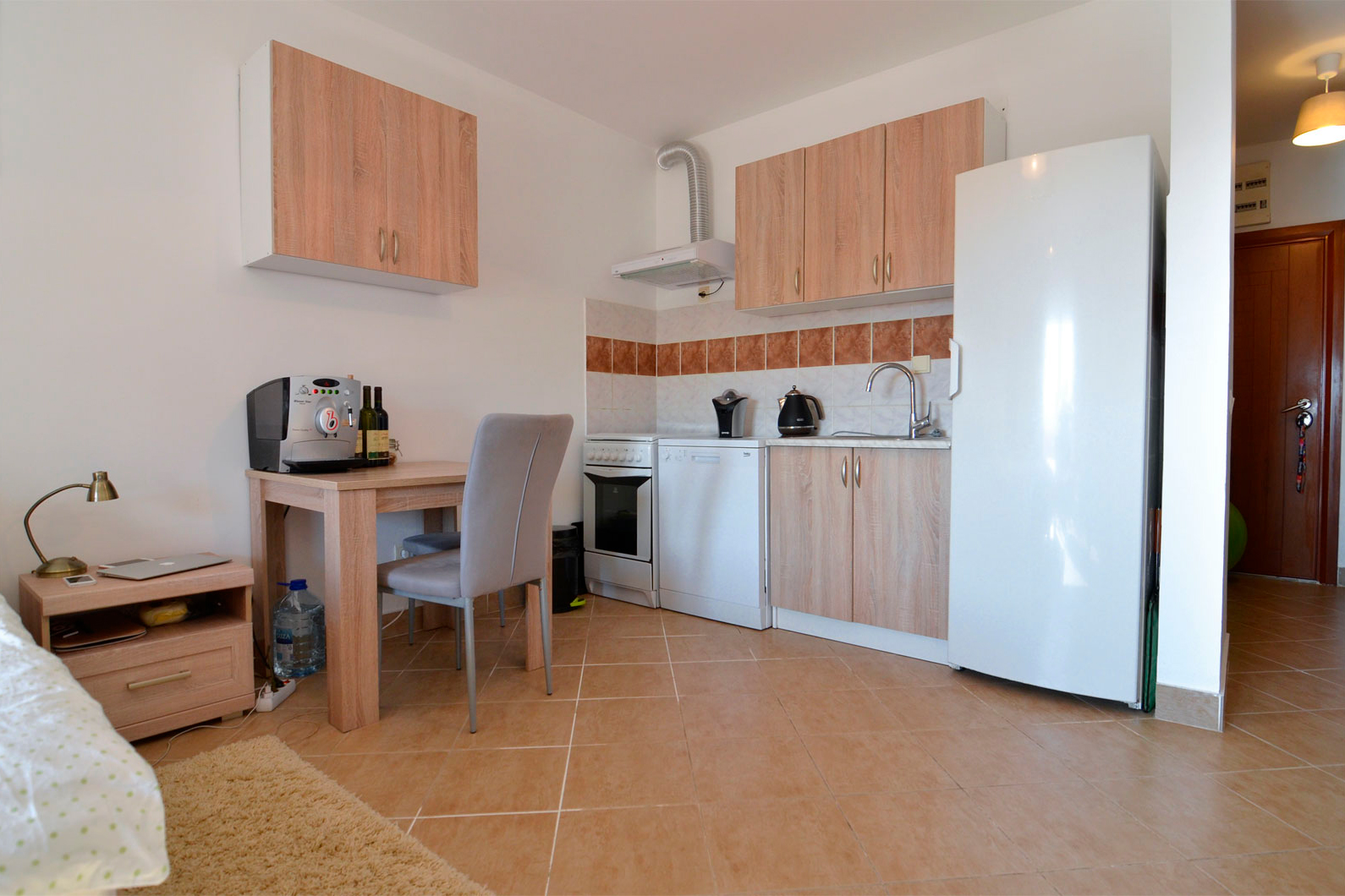 kitchen area in a studio apartment