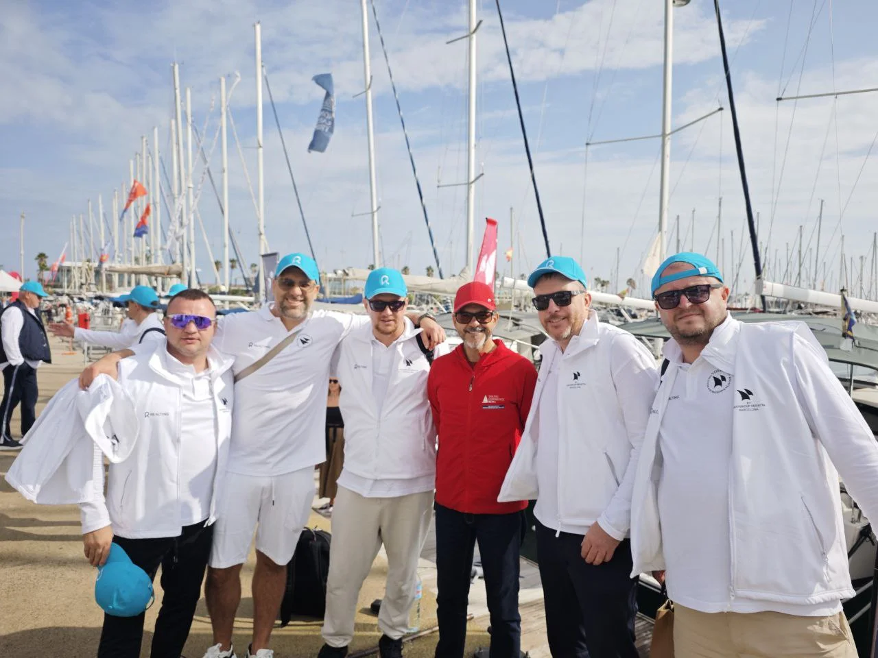 Realting Mastercup Regatta 2024 participants against the background of yachts