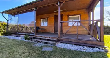 Дом в Naujatriobiai, Литва