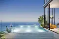 Complexe résidentiel New residence Villa del Divos with infinity pools, panoramic views and a beach club, Dubai Islands, Dubai, UAE