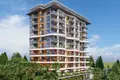 Kompleks mieszkalny New residence with swimming pools, security and a tennis court close to the sea, Demirtaş, Turkey