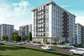 Квартира 1 комната 65 м² Бейликдюзю, Турция