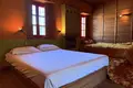 Traditional stone hotel of 320 sq.m. for sale in Central Zagori. It has 7 rooms (22 beds), café-bar, full FF&E equipment, and EOT license. Turnkey investment, €920,000