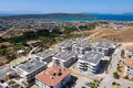 Wohnung in einem Neubau Wohnungen in Meeresnähe in einer bewachten Anlage in Çeşme