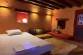 Traditional stone hotel of 320 sq.m. for sale in Central Zagori. It has 7 rooms (22 beds), café-bar, full FF&E equipment, and EOT license. Turnkey investment, €920,000