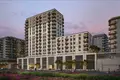 Wohnkomplex New Odessa Residence with a swimming pool, tennis courts and lounge areas 5 minutes away from the park, Town Square, Dubai, UAE