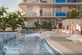 Residential complex New residence Samana Lake Views with swimming pools and lounge areas close to a highway, Production City, Dubai, UAE