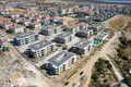 Wohnung in einem Neubau Wohnungen in Meeresnähe in einer bewachten Anlage in Çeşme