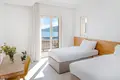 A luxurious two-bedroom apartment 124m2 with an open view of the sea and a swimming pool is for rent in Tivat, Luštica.