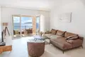A luxurious two-bedroom apartment 124m2 with an open view of the sea and a swimming pool is for rent in Tivat, Luštica.