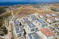 Wohnung in einem Neubau Wohnungen in Meeresnähe in einer bewachten Anlage in Çeşme