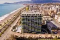 Жилой комплекс Меблированная квартира 2+1 в комплексе Konak Seaside Tower на первой береговой линии.