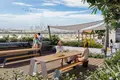 Complexe résidentiel The Portman residential complex with a swimming pool and lounge areas close to Burj Khalifa and Dubai Marina, JVC, Dubai, UAE