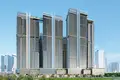 Residential complex New high-rise complex Milan Heights with infinity pools and tennis courts, City of Arabia, Dubai, UAE