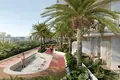 Kompleks mieszkalny New complex of furnished apartments Cove Grand with swimming pools, lounge areas and mini golf, Dubai Land Residence Complex, UAE