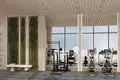 Kompleks mieszkalny New complex of furnished apartments Cove Grand with swimming pools, lounge areas and mini golf, Dubai Land Residence Complex, UAE