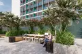 Complexe résidentiel UPSIDE Living — furnished apartments in a new residence by SRG Holding with a swimming pool and conference rooms in the modern district of Business Bay, Dubai