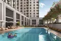 Wohnkomplex New Odessa Residence with a swimming pool, tennis courts and lounge areas 5 minutes away from the park, Town Square, Dubai, UAE