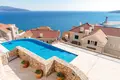 A luxurious two-bedroom apartment 124m2 with an open view of the sea and a swimming pool is for rent in Tivat, Luštica.