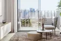 Complexe résidentiel The Portman residential complex with a swimming pool and lounge areas close to Burj Khalifa and Dubai Marina, JVC, Dubai, UAE