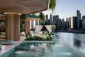 Kompleks mieszkalny New residence Eywa with swimming pools, lounge areas and waterfalls on the bank of the canal, Business Bay, Dubai, UAE