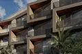 Wohnkomplex New complex of furnished apartments with a swimming pool and a view of the ocean, Bali, Indonesia