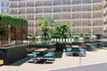 Complexe résidentiel Modern residential complex with a large swimming pool opposite a shopping center in Chalong, Phuket, Thailand
