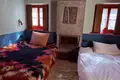 Traditional stone hotel of 320 sq.m. for sale in Central Zagori. It has 7 rooms (22 beds), café-bar, full FF&E equipment, and EOT license. Turnkey investment, €920,000
