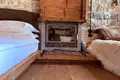 Traditional stone hotel of 320 sq.m. for sale in Central Zagori. It has 7 rooms (22 beds), café-bar, full FF&E equipment, and EOT license. Turnkey investment, €920,000