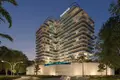 Residential complex New residence Samana Lake Views with swimming pools and lounge areas close to a highway, Production City, Dubai, UAE