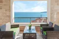 A luxurious two-bedroom apartment 124m2 with an open view of the sea and a swimming pool is for rent in Tivat, Luštica.